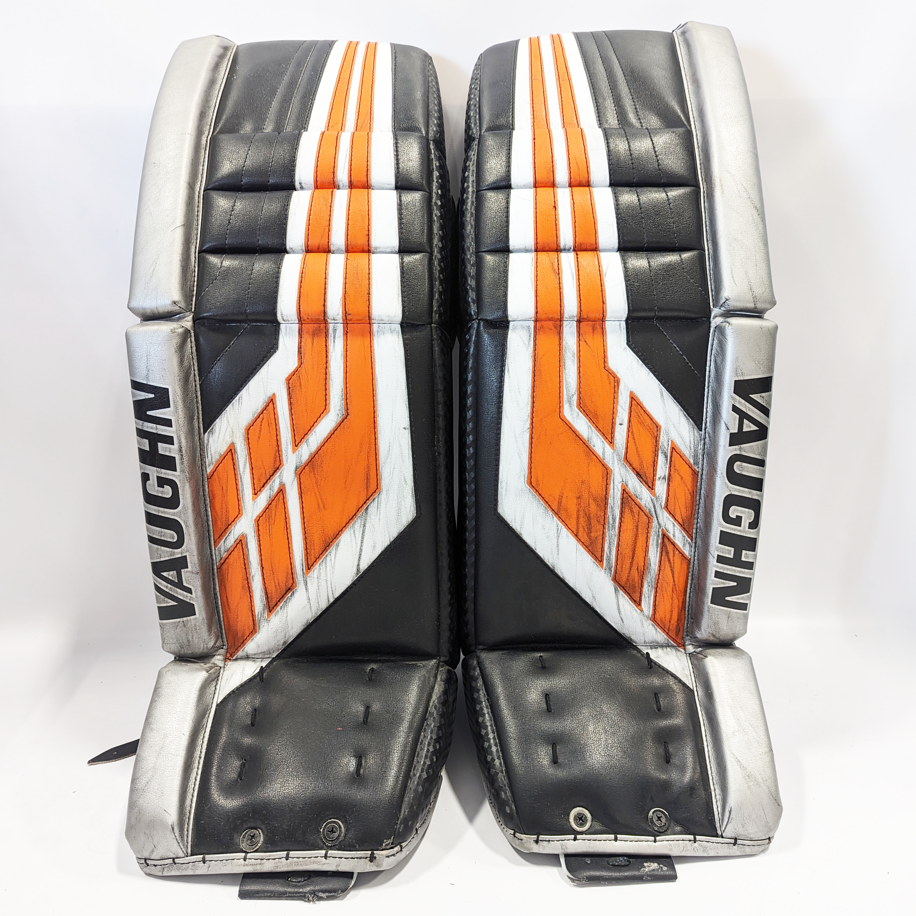 Vaughn Velocity VE8 - Jambières de gardien NCAA Pro Stock d'occasion (noir/orange/gris)